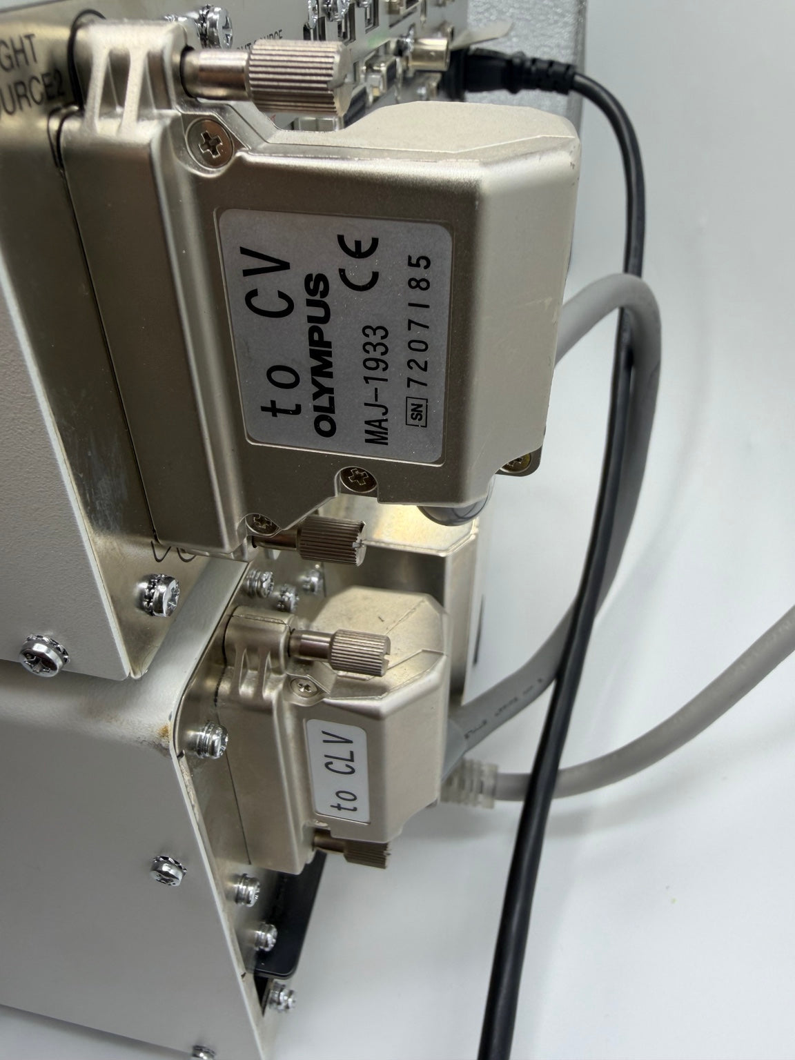Olympus connector cable and rear interface adapters pictured with CV-190 and CLV-190