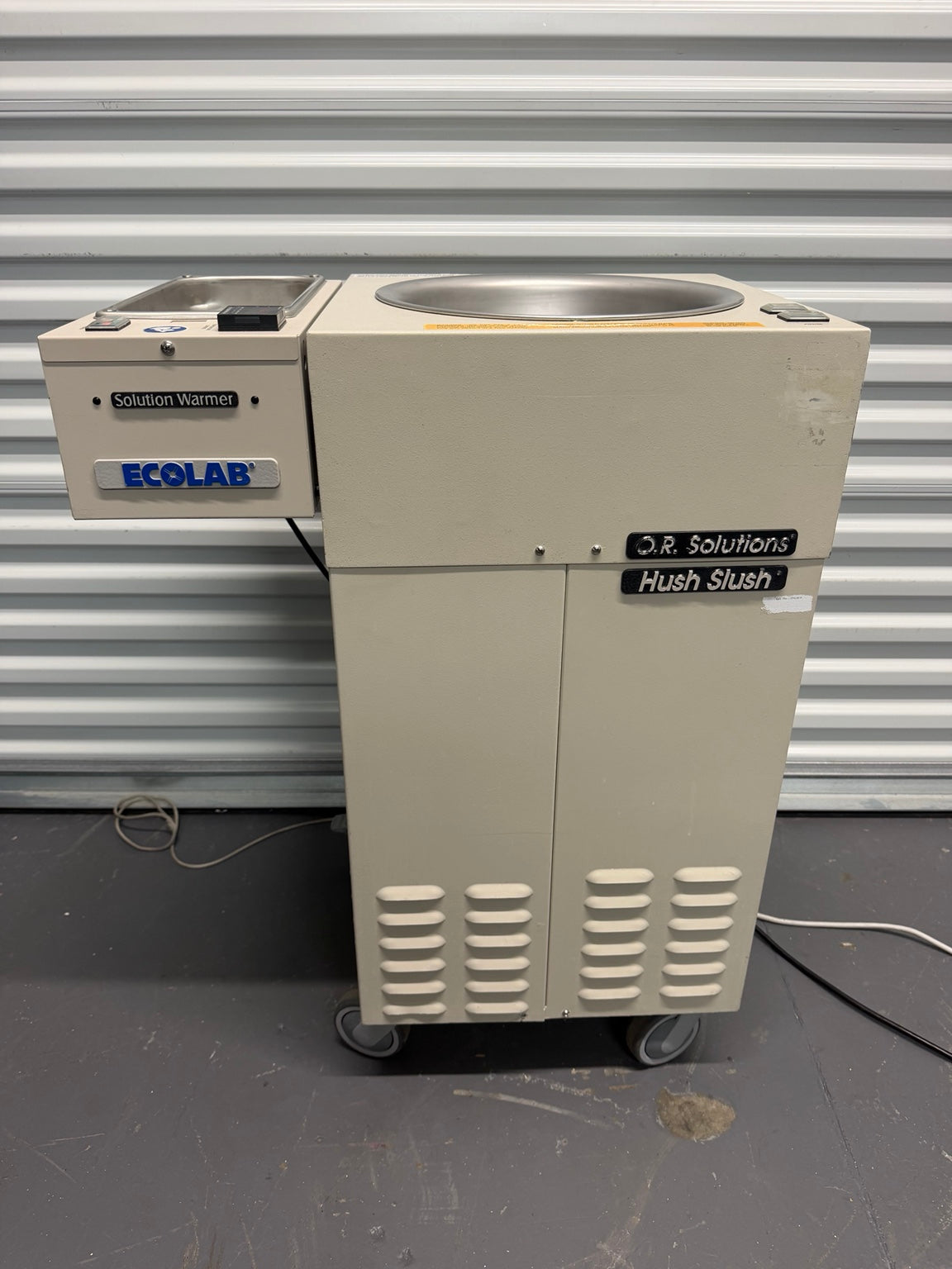 O.R. Solutions Hush Slush ORS-1075HS with attached Ecolab solution warmer