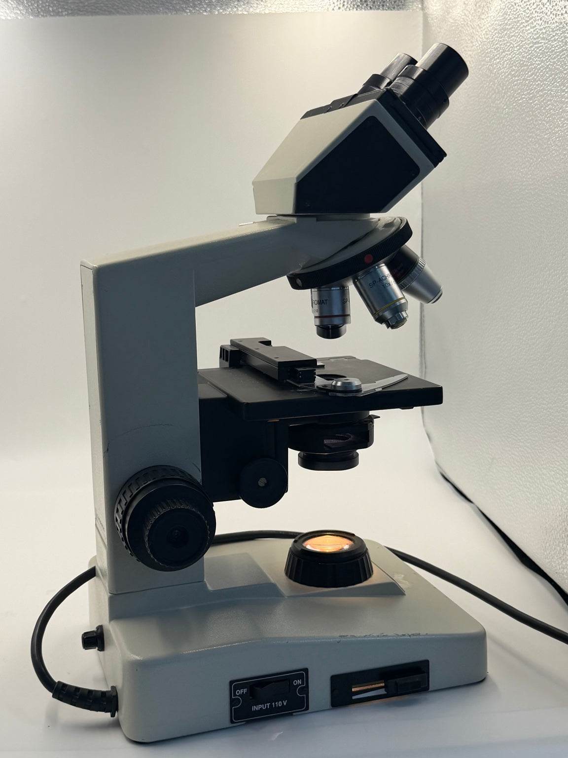 Seiler Microlux II microscope rear side view with service sticker